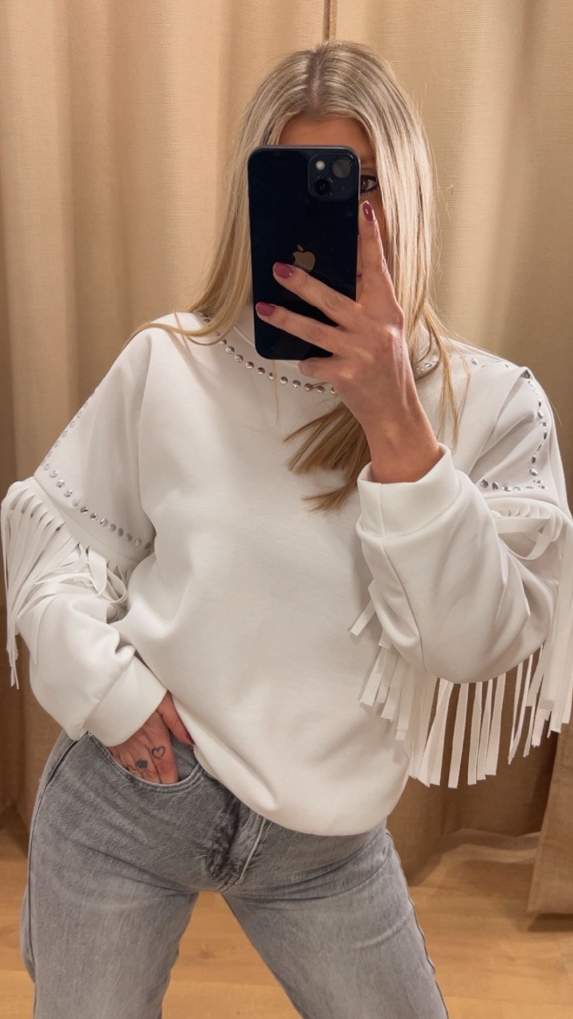 Sudadera flecos