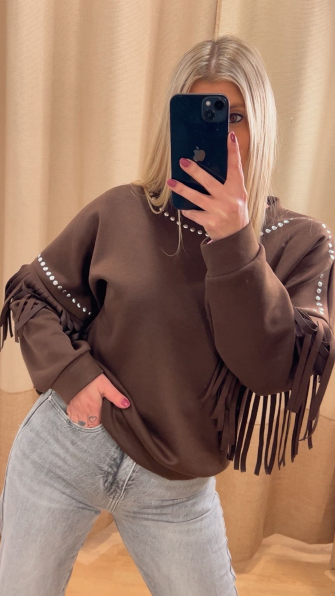 Sudadera flecos